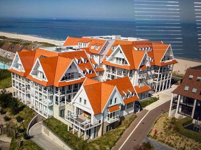 Familie beachhuis op de duinen (Duinhuis) in Cadzand-Bad, Zeeuwse Kust