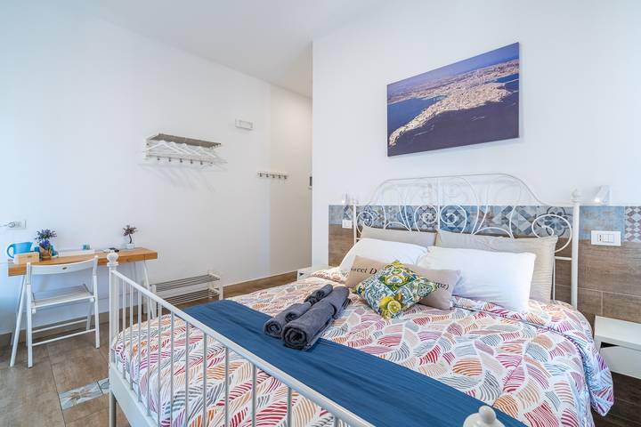 Maison d'hôtes 'Raudino Rooms - Ortigia' avec balcon, Wi-Fi et climatisation in Syracuse, Province de Syracuse