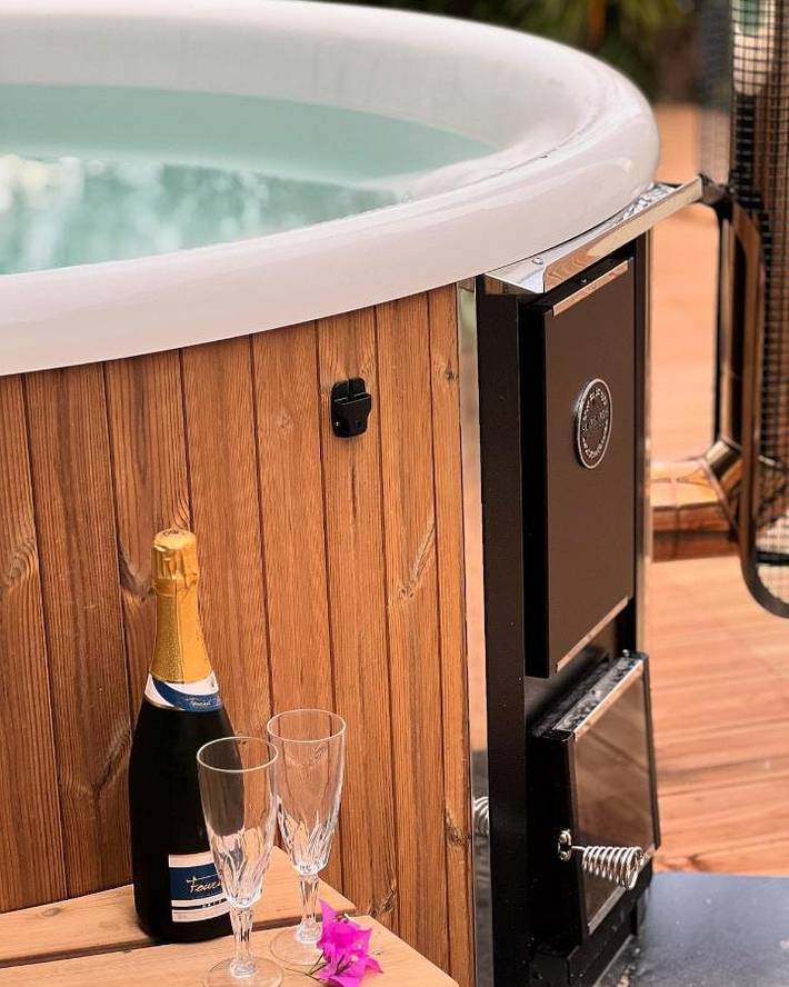 Appartement de vacances pour 2 personnes, avec jardin ainsi que balcon et jacuzzi
