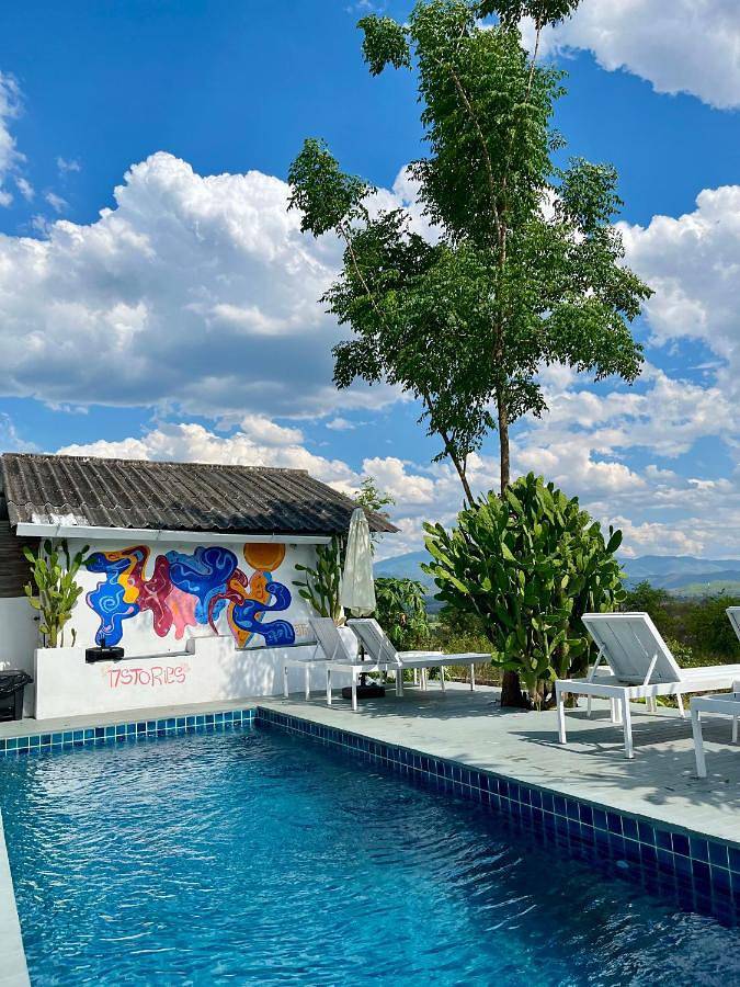 Location de vacances pour 2 personnes, avec terrasse ainsi que piscine et jardin à Pai