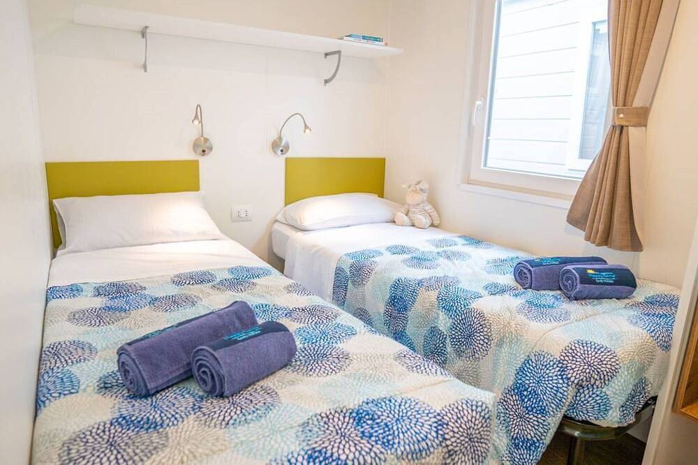Schöne Wohnung in einem Ferienhaus mit Pool, Klimaanlage,  W-Lan, Terrasse und Haustiere erlaubt in Lido ai Pioppi, Peschiera del Garda