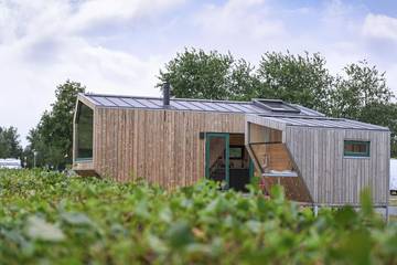 Ferienhaus mit Meerblick für 6 Personen, mit Terrasse und Ausblick sowie Sauna in Schillig