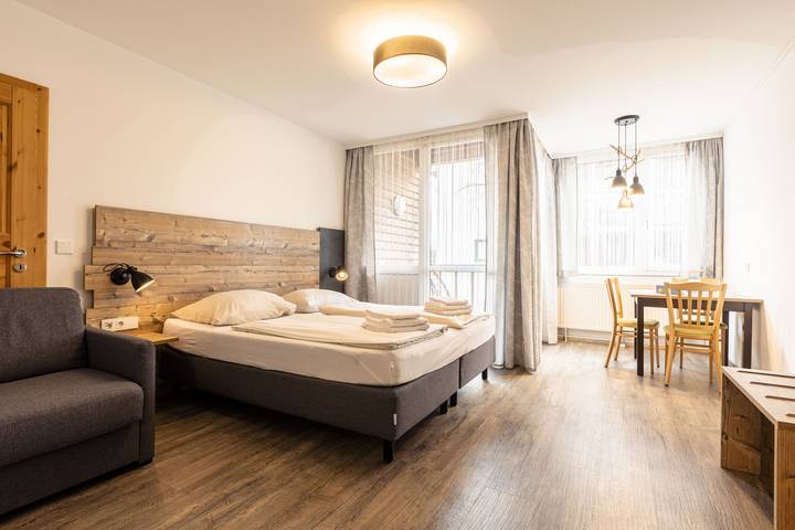 Ferienwohnung für 3 Personen, mit Balkon und Kinderpool sowie Sauna