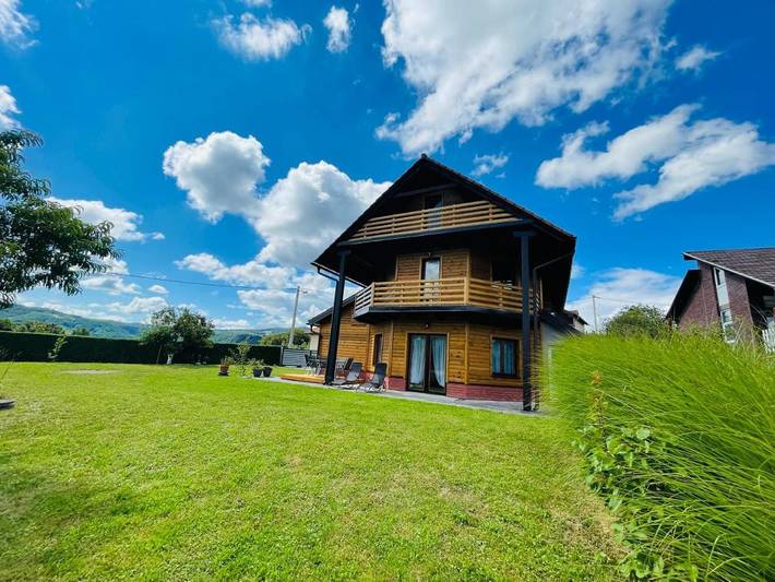 Appartement de vacances pour 5 personnes, avec Terrasse ainsi que Jardin et Vue