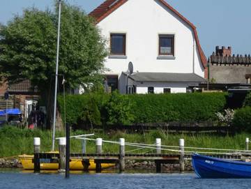 Ferienwohnung für 4 Personen, mit Terrasse und Garten sowie Seeblick und Ausblick in Maasholm