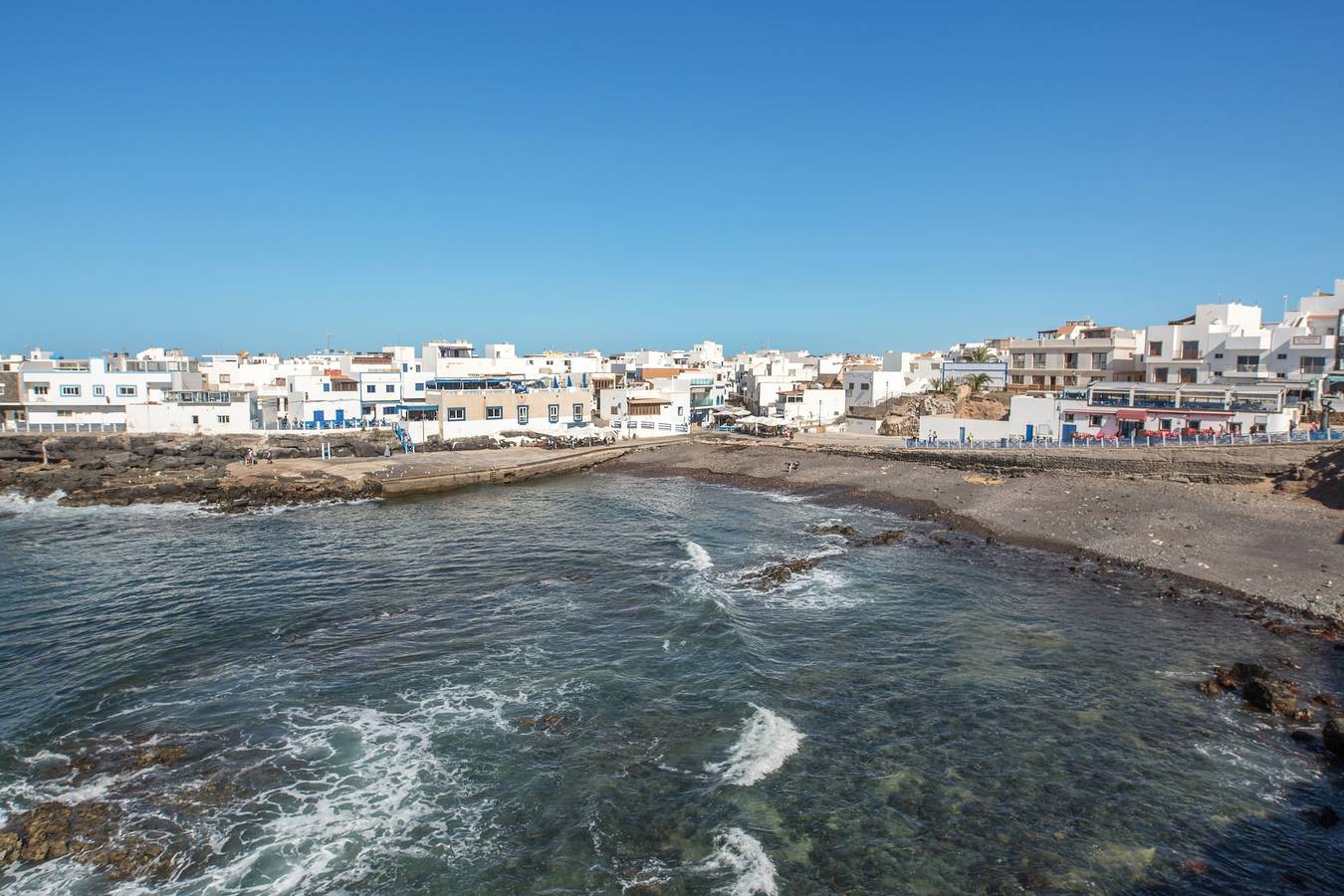 Appartement entier, Appartement central "El Muellito" sur la plage avec terrasse sur le toit et Wi-Fi in El Cotillo, La Oliva