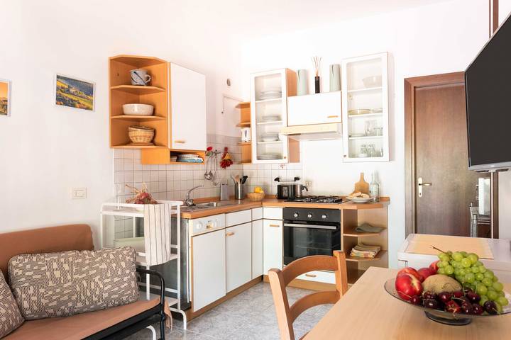 Appartamento per 2 persone, con sauna e giardino nonché idromassaggio, con animali domestici in Marciana