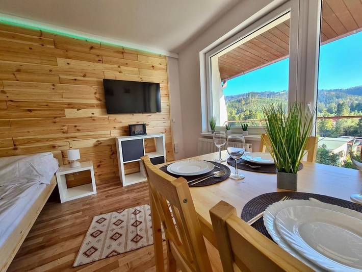 Ferienwohnung für 4 Personen, mit Balkon und Terrasse sowie Whirlpool und Garten