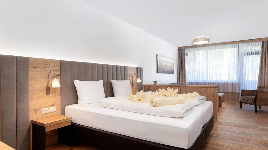 Ferienwohnung für 4 Personen, mit Garten und Sauna sowie Balkon und Pool in Bad Goisern am Hallstättersee