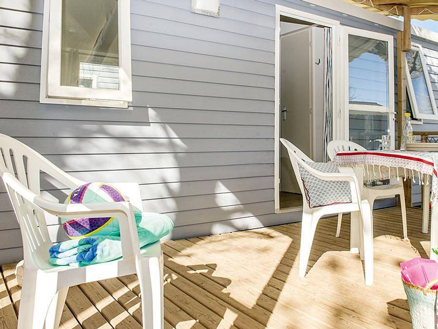 Camping Le Petit Mousse - Mobilhome 4 personnes - Mobil-home | Comfort Xl | 2 Ch. | 4 Pers. | Terrasse surélevée | Clim. in Vias Plage, Vias