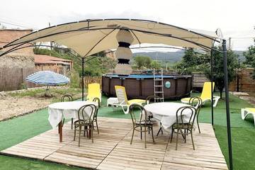 Casa rural con piscina para 13 personas, con piscina y jardín, Se admiten mascotas en Provincia de Huesca