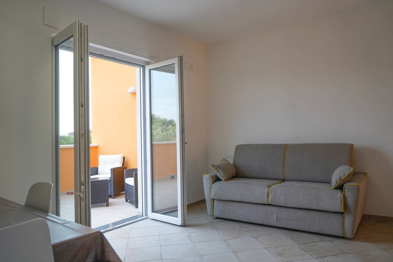 Entire apartment, Oliblu Holiday Home – Superior Taggiasca Apartment with Partial Sea View in Vibonati, Cilento Coast
