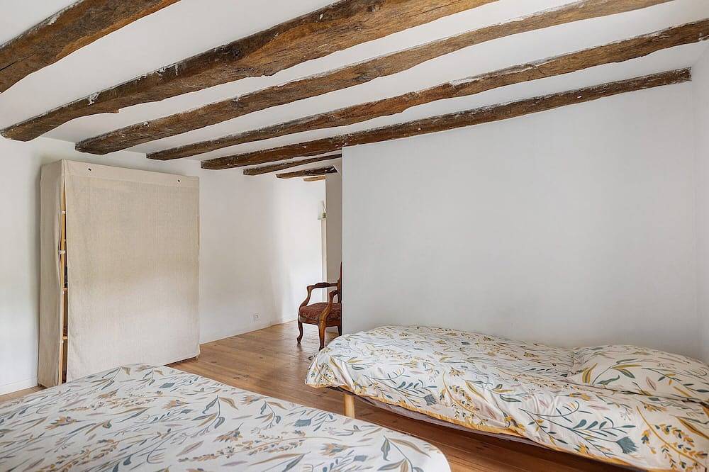 Chambre Familiale avec terrasse partagée, jardin commun et Wi-Fi in La Possonnière, Vallée de la Loire