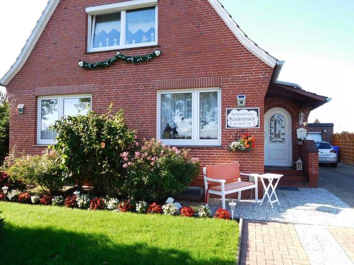 Ferienwohnung für 4 Personen, mit Pool und Garten sowie Seeblick und Ausblick in Lüdingworth