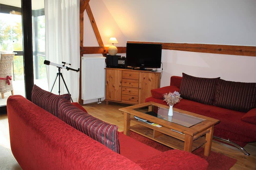 Appartement entier, Appartement avec jardin d'hiver et vue sur le lac - Ferienhof Löschebrand in Bad Saarow, Dahme-Seengebiet