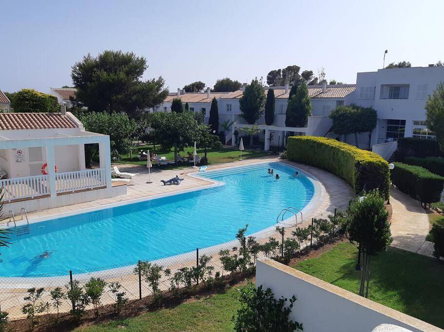 Appartement entier, Son Xoriguer appartement calme, mer, piscines.Son Xoriguer quiet apartment, sea, swimming pools. in Son Xoriguer, Ciutadella