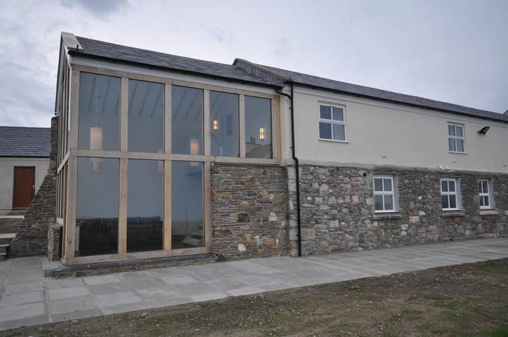 Ferienhaus für 15 Personen, mit Terrasse und Garten sowie Ausblick in Isle of Man