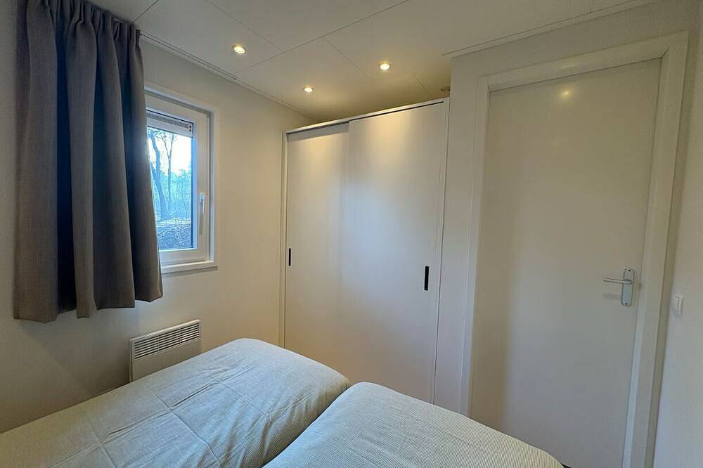 Luxury chalet with hot tub in wooded area of the Sallandse Heuvelrug in Sallandse Heuvelrug