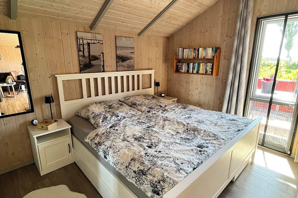 Ferienhaus \"Sanderling\" -  gemütliches Holzhaus mit Blick auf die Schafswiesen in Kating, Tönning