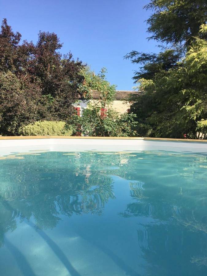 Maison de vacances pour 2 personnes, avec piscine et bassin pour enfant ainsi que vue et jardin