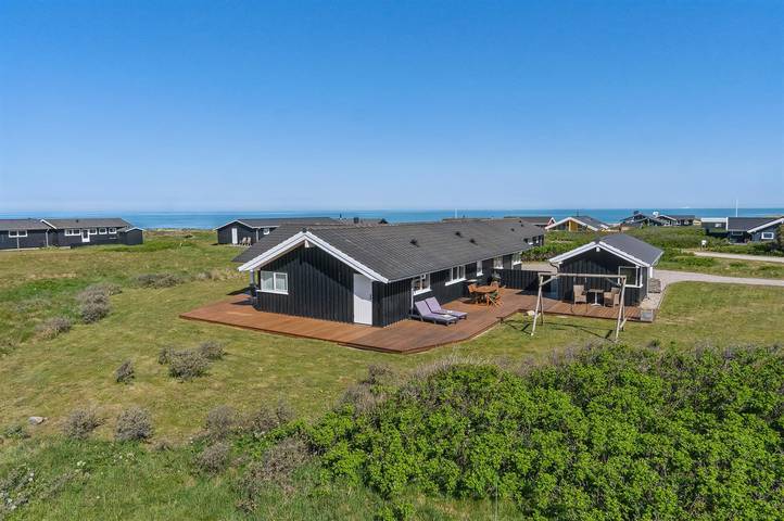 Ferienhaus für 8 Personen, mit Terrasse und Whirlpool sowie Sauna in Nørlev Strand