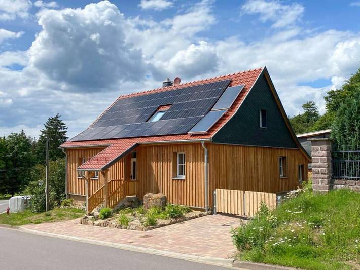 Ferienhaus für 8 Personen, mit Terrasse und Garten sowie Sauna und Ausblick