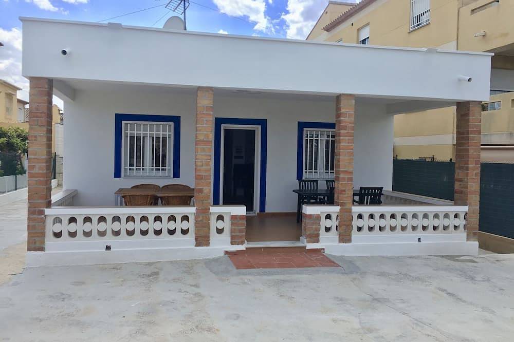 Unifamiliar a pié de la Playa de Oliva en la Urb. Kiko, en parcela privada in Oliva, Costa de Valencia