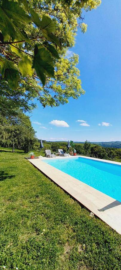 Maison de vacances pour 2 personnes, avec Terrasse et Jardin ainsi que Piscine et Vue