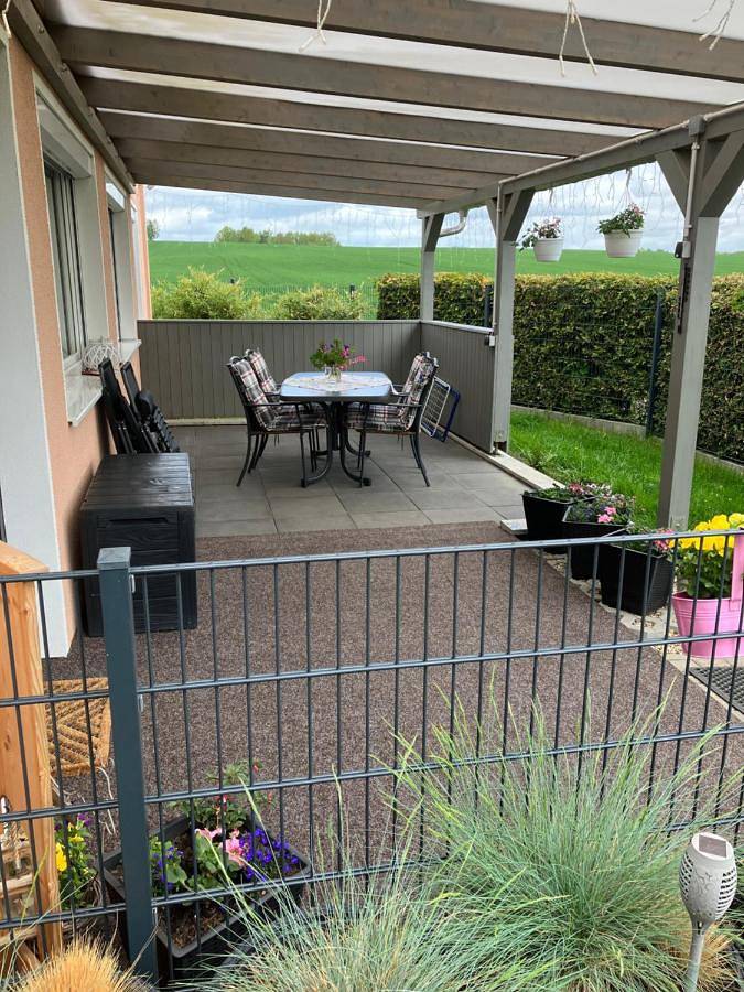 Ferienwohnung für 4 Personen, mit Terrasse und Garten sowie Ausblick