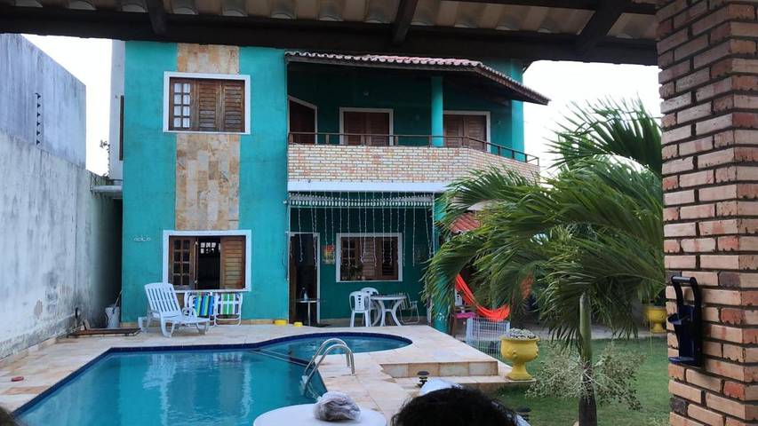 Casas e apartamentos de temporada para 22 pessoas, com piscina infantil e jardim e ainda vista and piscina, com animais de estimação em Paracuru