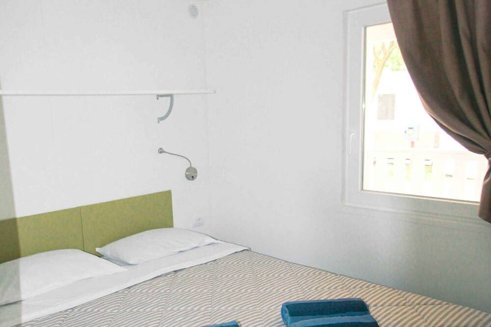 Maison mobile avec climatisation, terrasse et piscine in Torre di Bari, Bari Sardo