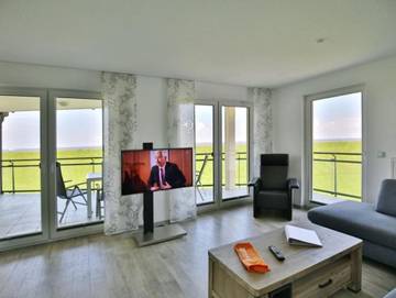 Ferienwohnung für 4 Personen, mit Balkon und Seeblick in Grimmershörn