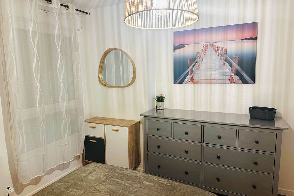 Entire apartment, Le cocon urbain, quiet apartment with garden for 4 people 2 minutes from Vannes in Plescop, Côte des Mégalithes