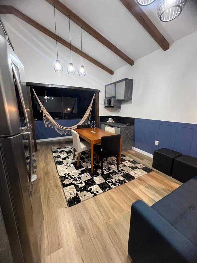 Casas e apartamentos de temporada para 4 pessoas, com jardim e vista para o lago e ainda vista, adaptado a crianças na Praia do Rosa