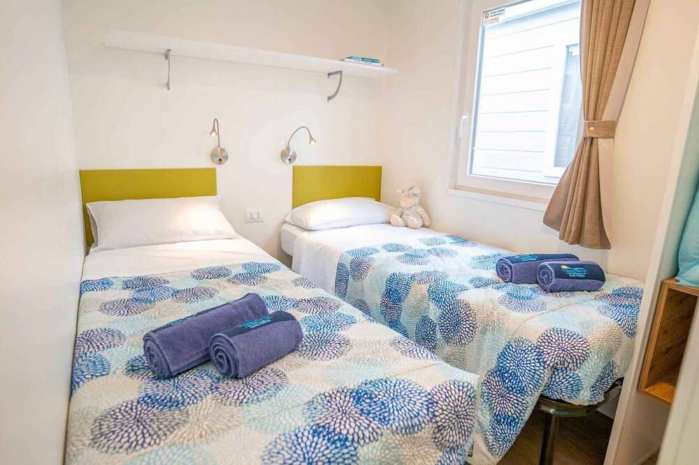 Maison mobile avec climatisation, terrasse et piscine in Torre di Bari, Bari Sardo
