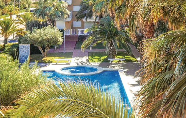 Apartamento vacacional entero, Apartamento junto a la playa con piscina y terraza in Platja de Terranova (Piles), Piles