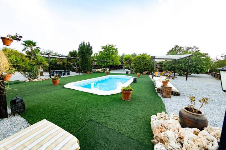 Gîte pour 12 personnes, avec Terrasse et Jardin ainsi que Piscine et Vue à La Zubia