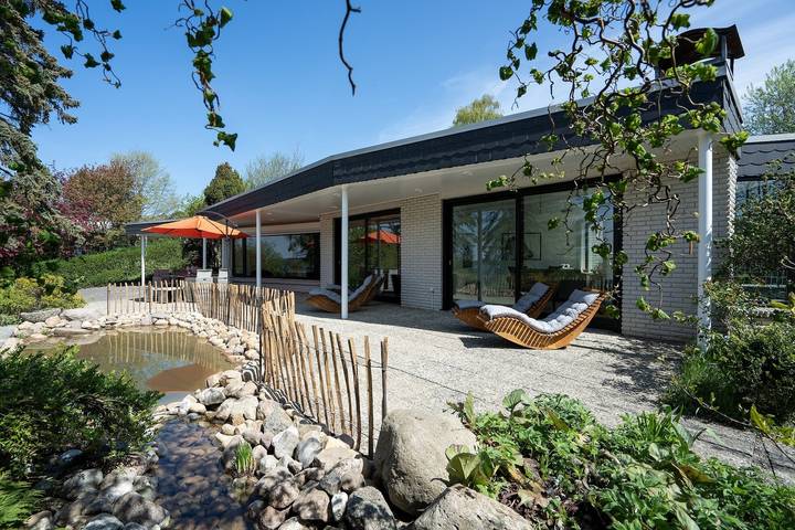 Ferienhaus für 9 Personen, mit Terrasse und Garten sowie Sauna in Bosau