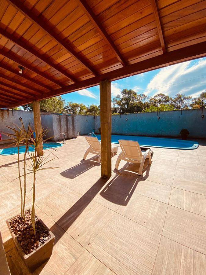 Casas e apartamentos de temporada para 16 pessoas, com jardim e piscina em Laguna