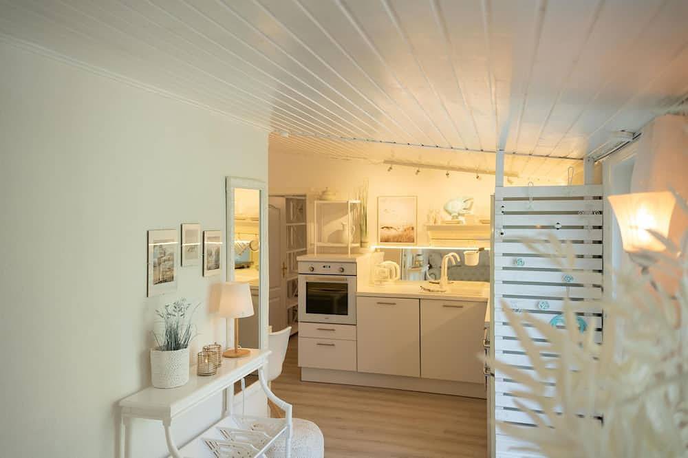 Ganze Wohnung, Stilvolle Ferienwohnung für 2 Personen in Friederikensiel mit Gartenzugang, gemütlichem Wohnbereich, voll ausgestatteter Küche und ruhiger Lage nahe der Nordsee. in Friederikensiel, Wangerland