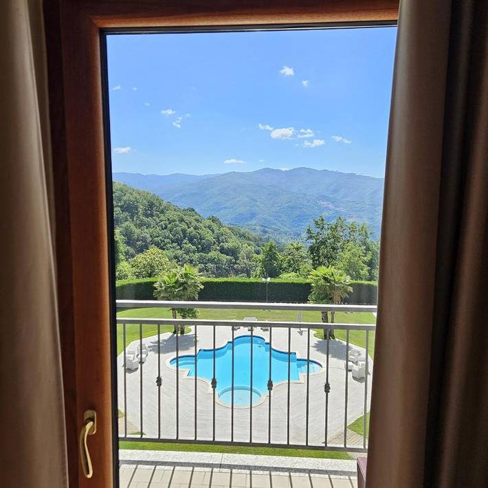 Hôtel pour 3 personnes, avec Balcon et Terrasse ainsi que Jardin et Bassin pour enfant à Bianchi