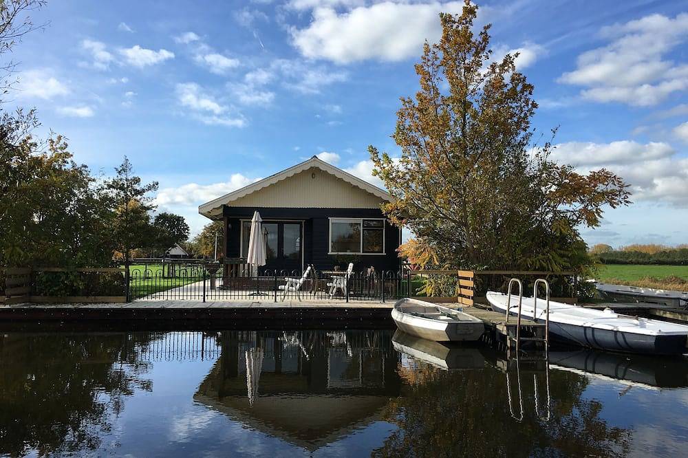 Ganze Wohnung, De Duif - Small country house, directly on the lake, in a nature reserve in Breukelen, Groene Hart