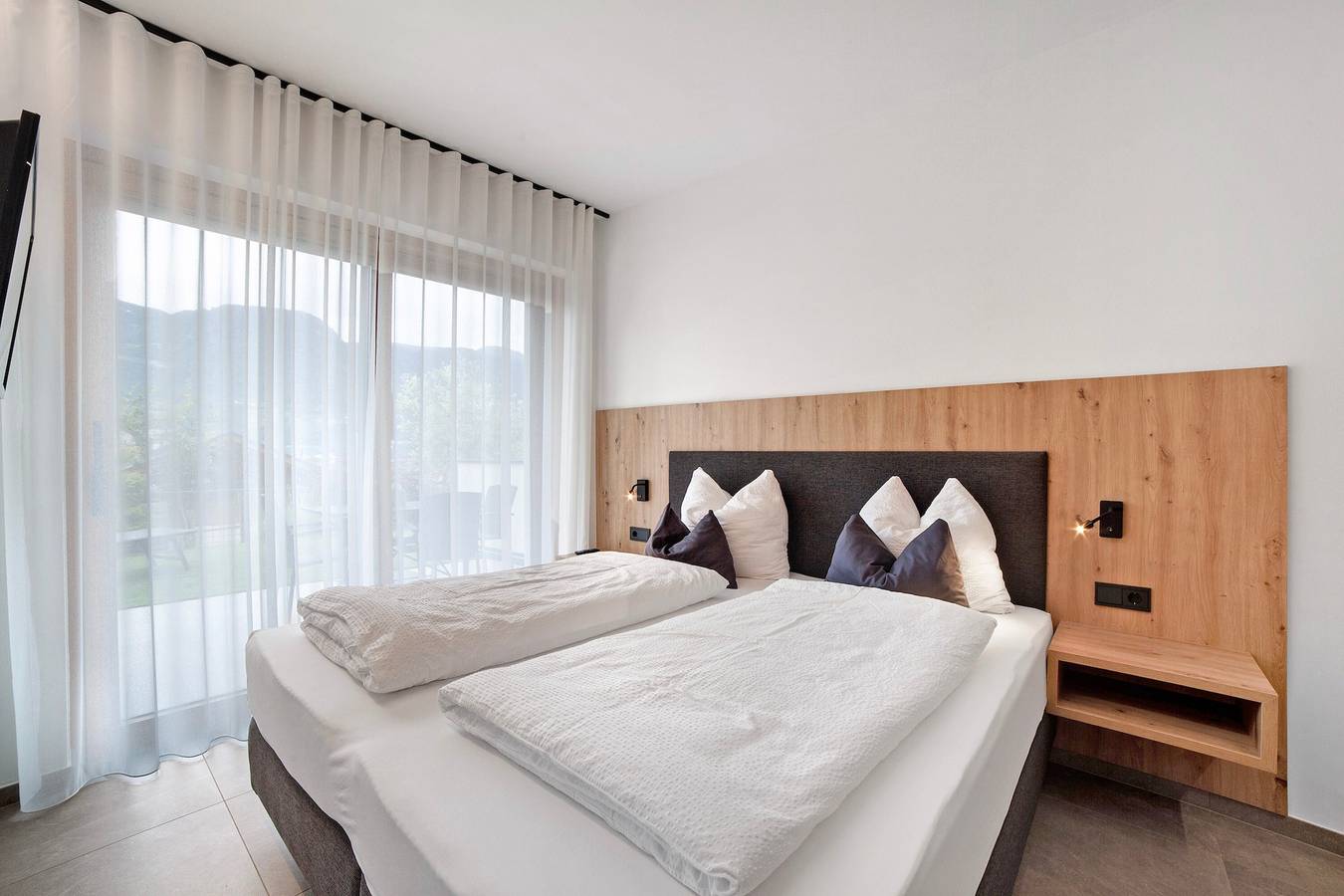 Apartamento entero, Apartamento 'Pinot Grigio' con vistas a la montaña, terraza privada y Wi-Fi in Marling, Ortler Alps