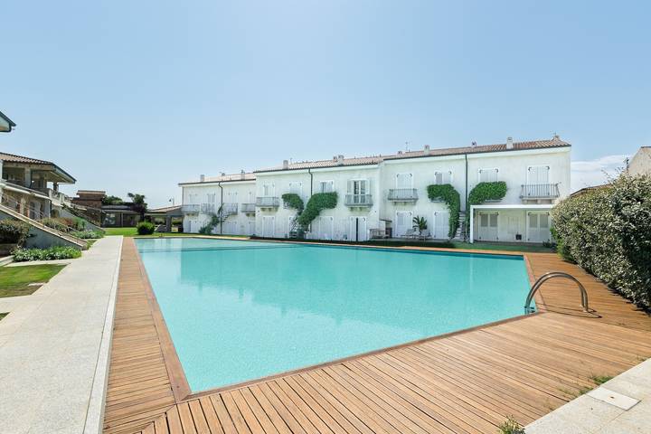 Holiday Home 'Il Gabbiano Perle 11 Turchese' with Pool View, Air Conditioning in Palau (town), Palau (Sardinia)