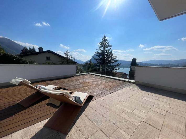 Ferienwohnung für 4 Personen, mit Terrasse und Garten sowie Sauna und Seeblick
