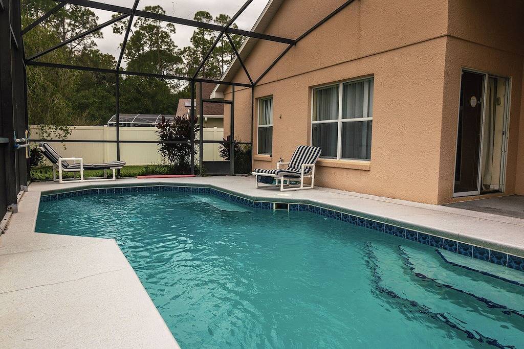 Spacious Home w/ Private Covered Pool & Game Room - Short Drive to Disney World in Kissimmee, Osceola County