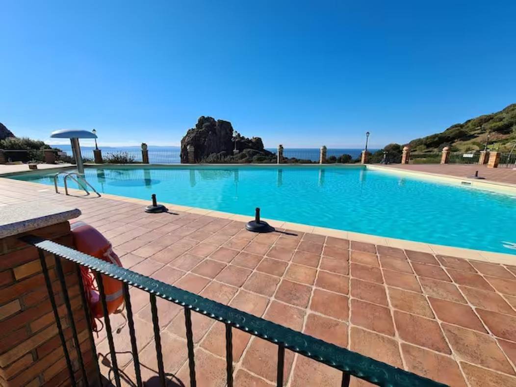 Haus 'Red Coral' mit Gemeinschaftspool in Nebida, Iglesias