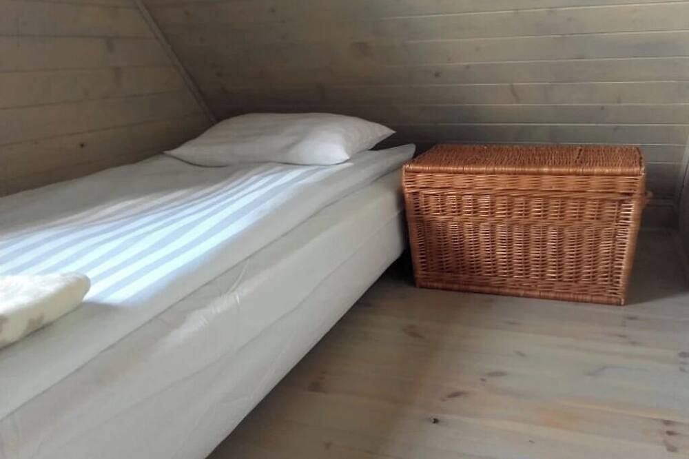 Sommerhaus aus Holzbalken in Mauersee