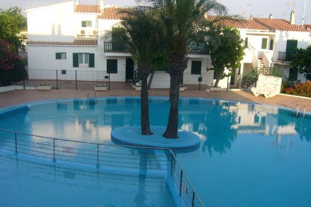 Entire apartment, Ground floor apartment, with garden and direct access to pool. A. A. Free Wifi in Cala Blanes, Ciutadella