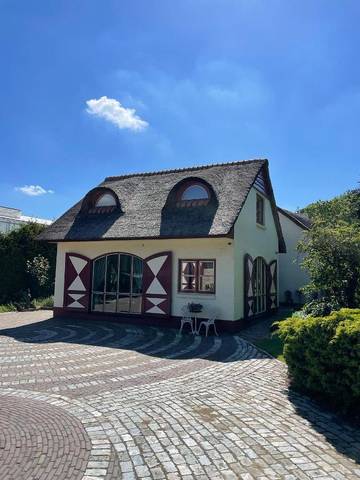 Ferienwohnung für 4 Personen, mit Terrasse und Garten sowie Ausblick in Westland